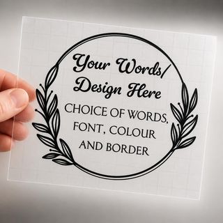Clear vinyl decal sample with a leafy wreath: “Your words or design here, choice of words, font, colour and border”