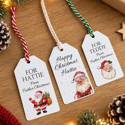 Three white gift tags with vintage Santa illustrations, personalised “For Hattie” and “For Teddy”