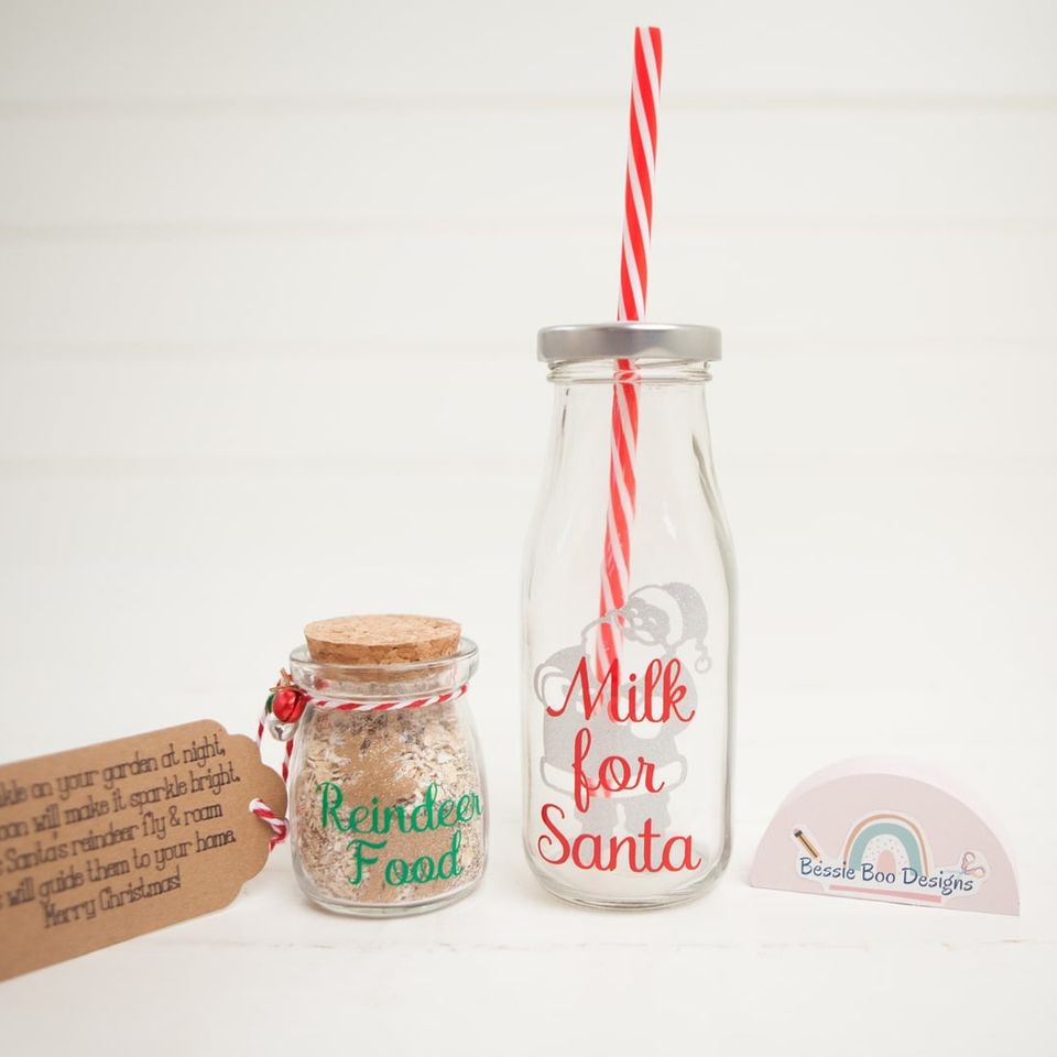 Small cork-topped jar of reindeer food and a glass “Milk for Santa” bottle with a striped straw
