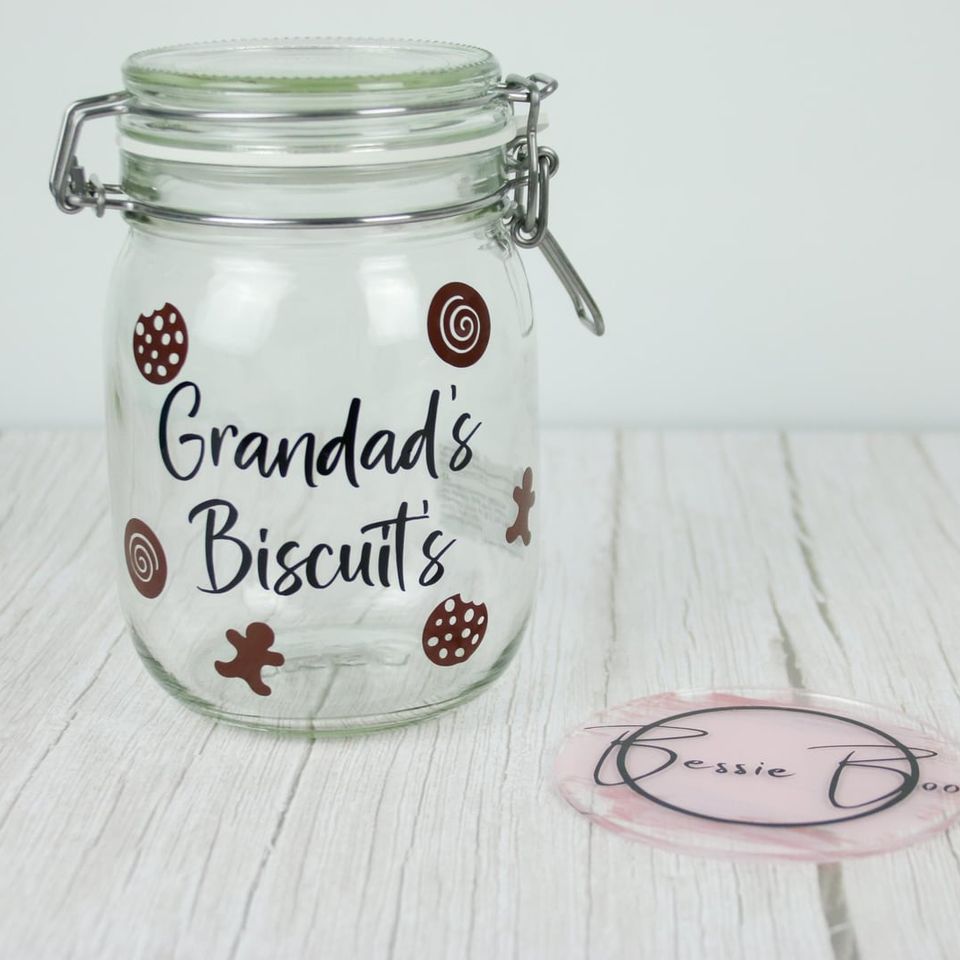 Clip-top glass jar lettered “Grandad’s Biscuits” with biscuit illustrations