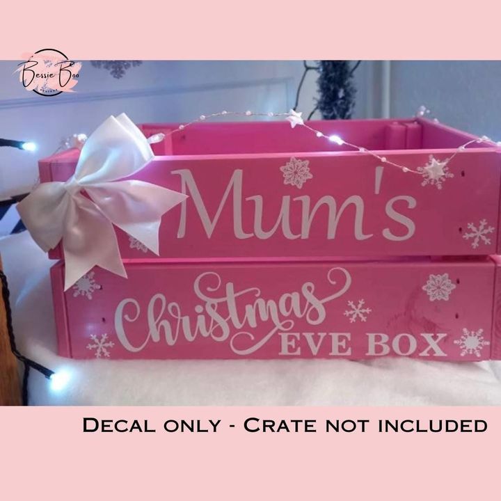 Pink crate with decals reading “Mum’s Christmas Eve Box” and snowflakes. Decal only, crate not included